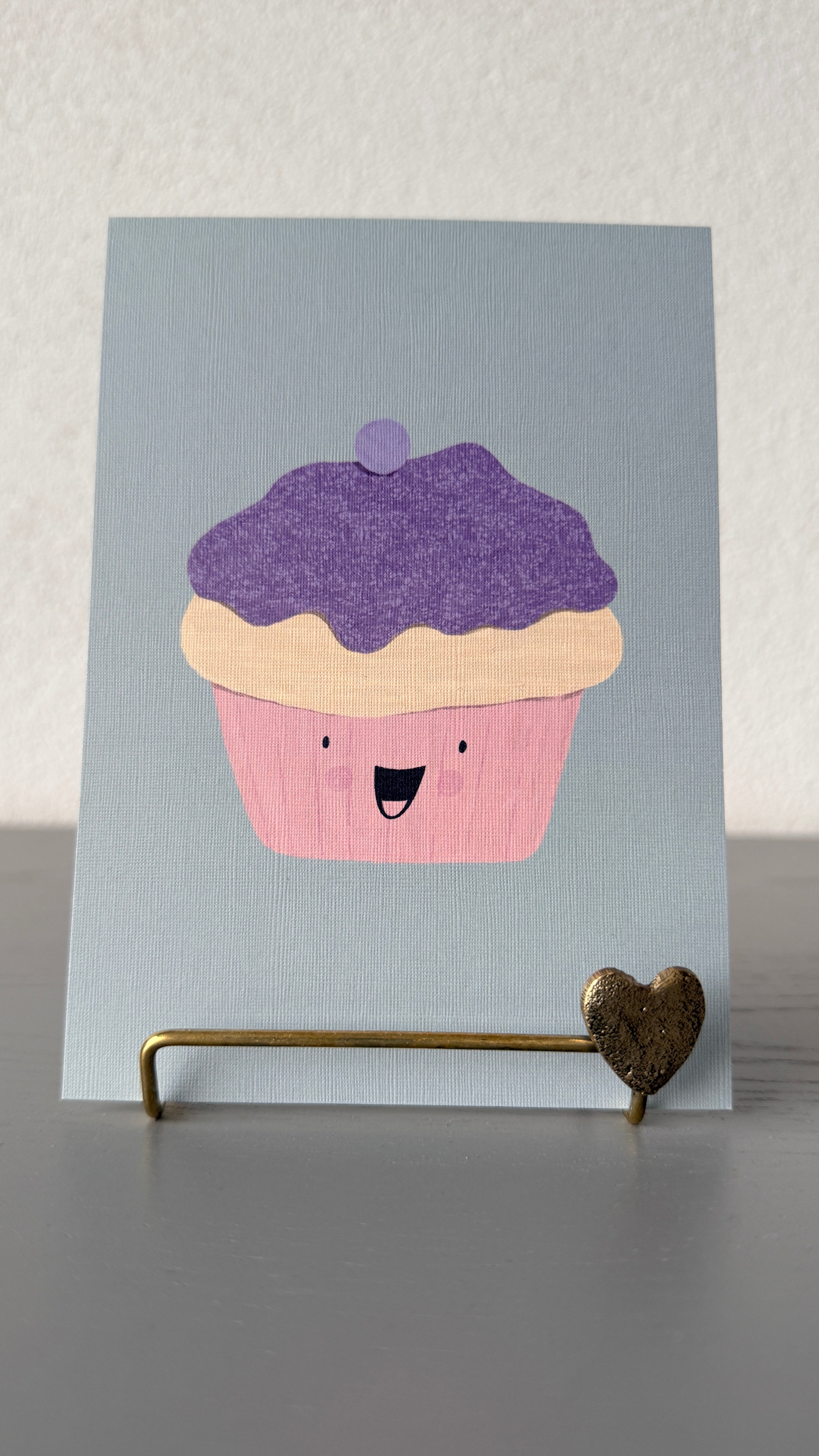 Cupcake met paars snoepje